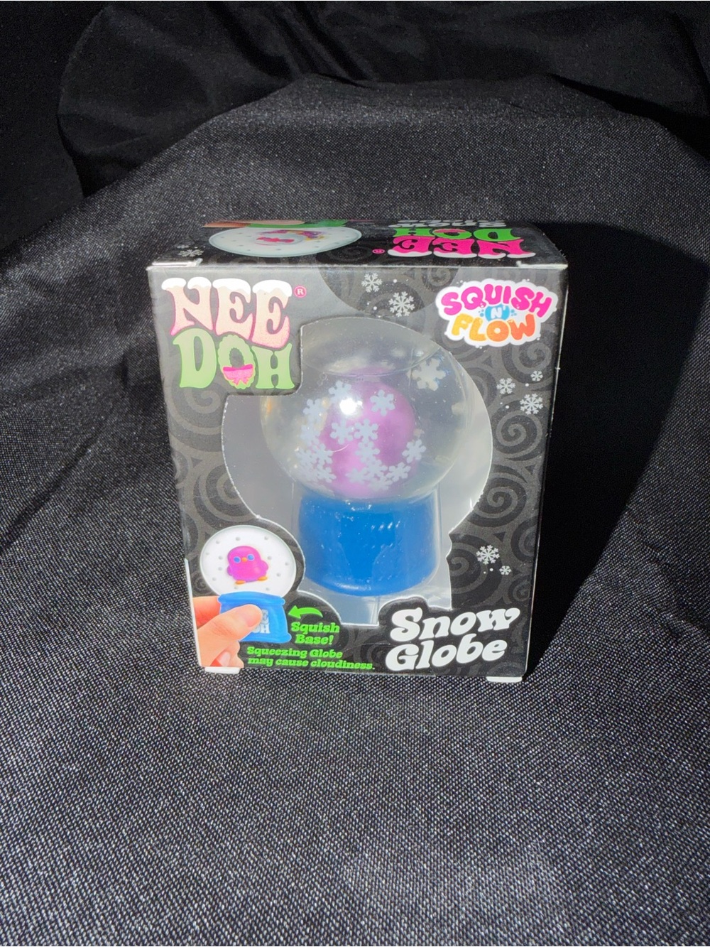 Needoh Squish Flow Snow Globe - Blue Base, Pink Insert